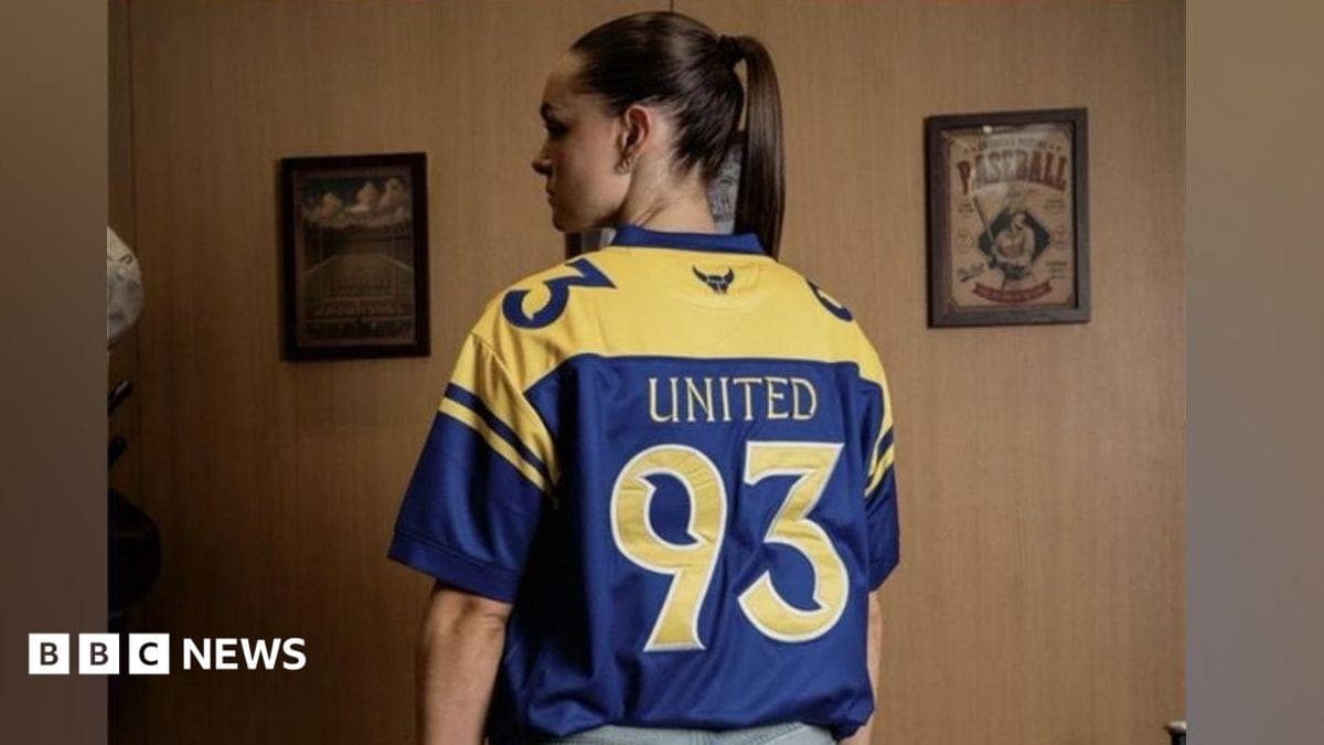 Oxford apologise for United 93 shirt advert