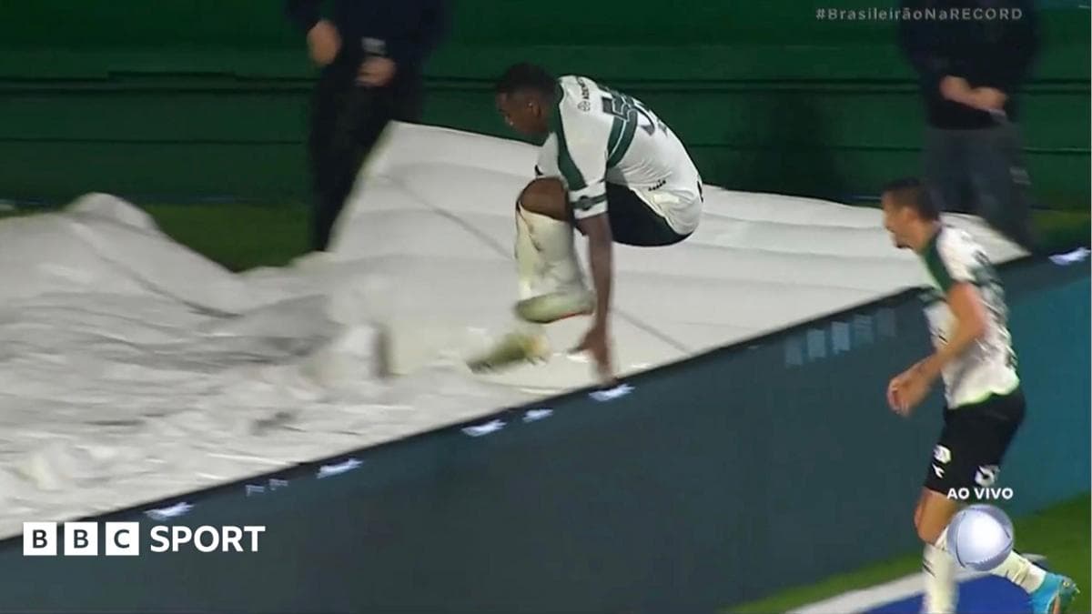 Brazilian player falls down tunnel during goal celebration